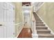 Two-story entry with hardwood floors and elegant staircase at 255 Thornbush Ln, Lawrenceville, GA 30046