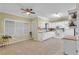 Bright eat-in kitchen with white cabinets and tile floor at 255 Thornbush Ln, Lawrenceville, GA 30046