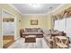 Cozy living room featuring neutral-toned furniture and a patterned rug at 255 Thornbush Ln, Lawrenceville, GA 30046