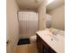 Simple bathroom with single vanity, toilet, and shower at 2611 Cannon Farm Ln, Duluth, GA 30097