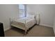 Cozy bedroom with carpeted floors and a neutral color scheme at 2611 Cannon Farm Ln, Duluth, GA 30097