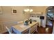 Formal dining room with hardwood floors and a built-in hutch at 2611 Cannon Farm Ln, Duluth, GA 30097