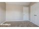 Bedroom featuring neutral walls, carpet, and dual closets with white trim at 2295 Creekview Trl, Decatur, GA 30035