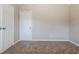 Bedroom with neutral walls, soft carpet, and a closet at 2295 Creekview Trl, Decatur, GA 30035