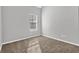 Neutral bedroom with a cozy carpet and bright window view at 2295 Creekview Trl, Decatur, GA 30035