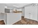 Well-appointed kitchen with wood floors, neutral color palette, granite counter tops, and stainless appliances at 2295 Creekview Trl, Decatur, GA 30035