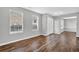 Beautiful living room with modern gray walls, white trim, and wood-look floors throughout at 2295 Creekview Trl, Decatur, GA 30035