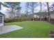 Large backyard with grassy lawn and a patio at 3029 Oakvale Hts, Decatur, GA 30034