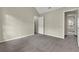 Spacious bedroom with grey carpet and vaulted ceiling at 3029 Oakvale Hts, Decatur, GA 30034