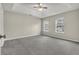 Large bedroom with grey carpet and ceiling fan at 3029 Oakvale Hts, Decatur, GA 30034