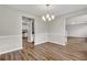 Bright dining room with hardwood floors and chandelier at 3029 Oakvale Hts, Decatur, GA 30034