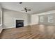 Open concept living room with hardwood floors and kitchen access at 3029 Oakvale Hts, Decatur, GA 30034