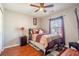 Cozy bedroom with double bed and ceiling fan at 3363 Fernview Dr, Lawrenceville, GA 30044