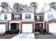 Brick front exterior of charming townhome with 2-car garage at 3363 Fernview Dr, Lawrenceville, GA 30044