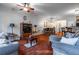 Spacious living room with hardwood floors, gray sofas, and wood accents at 3363 Fernview Dr, Lawrenceville, GA 30044