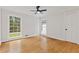 Well-lit bedroom with hardwood floors and two large windows at 514 Dogwood Cir, Norcross, GA 30071