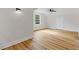 Bedroom with hardwood floors and large windows at 514 Dogwood Cir, Norcross, GA 30071