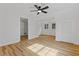 Bedroom with hardwood floors, ceiling fan and closet at 514 Dogwood Cir, Norcross, GA 30071