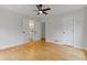 Bright bedroom with hardwood floors and access to bathroom at 514 Dogwood Cir, Norcross, GA 30071