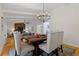 Dining room with wood table and chandelier at 514 Dogwood Cir, Norcross, GA 30071