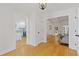 Bright and airy entryway with hardwood floors and views of the kitchen and living areas at 514 Dogwood Cir, Norcross, GA 30071