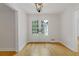 Bright and airy entryway with hardwood floors and french doors leading to backyard at 514 Dogwood Cir, Norcross, GA 30071