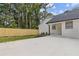 Rear view of house with wooden fence and patio at 514 Dogwood Cir, Norcross, GA 30071