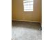 Small bedroom with carpeted floor and window at 6354 Shannon Pkwy # 30D, Union City, GA 30291