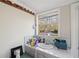 Bathroom with a tiled vanity sink, large window, and bright lighting at 7034 Capps Ferry Rd, Douglasville, GA 30135