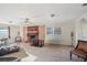 Cozy living room with a decorative fireplace and comfortable seating at 7034 Capps Ferry Rd, Douglasville, GA 30135