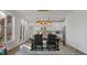 Dining area with a large table, black chairs, and a view of the kitchen at 2908 Silver Hill Ter, Atlanta, GA 30316