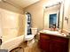 Clean bathroom with shower/tub combo and vanity at 520 Millbrook Village Dr, Tyrone, GA 30290