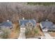 Aerial view of the home showing the roof, driveway, and surrounding neighborhood at 6834 Fireside Ln, South Fulton, GA 30349
