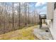 View of the backyard and deck of the house next to a wooded area at 6834 Fireside Ln, South Fulton, GA 30349