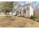 Two-story brick home with a well-maintained lawn and large trees at 6834 Fireside Ln, South Fulton, GA 30349