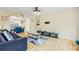 Open-concept living room with hardwood floors and modern decor at 6834 Fireside Ln, South Fulton, GA 30349