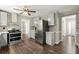 Charming kitchen with stainless steel appliances, custom cabinets, and eye-catching backsplash at 855 Riverbend Sw Dr, Lilburn, GA 30047