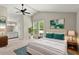 Spacious bedroom with a vaulted ceiling, carpeted floor, and two windows at 855 Riverbend Sw Dr, Lilburn, GA 30047