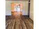 View through dining room to living room with hardwood floors at 134 Amherst Nw Pl, Atlanta, GA 30327