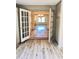 Open dining room with hardwood floors and chandelier at 134 Amherst Nw Pl, Atlanta, GA 30327