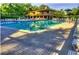 Community pool with lounge chairs and clubhouse view at 134 Amherst Nw Pl, Atlanta, GA 30327