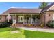 Inviting front porch with rocking chairs and landscaping at 144 Bobs Sw Dr, Mableton, GA 30126