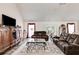 Relaxing living room with hardwood floors and ample natural light at 144 Bobs Sw Dr, Mableton, GA 30126