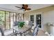 Enjoyable screened porch with dining set and access to backyard at 144 Bobs Sw Dr, Mableton, GA 30126