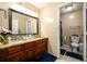 Bathroom with double vanity and shower/tub combo at 3241 Briscoe Rd, Loganville, GA 30052