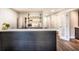 Modern wet bar with sleek cabinetry and quartz countertops at 7715 Ryefield Dr, Sandy Springs, GA 30350