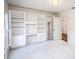 Versatile bedroom with built-in shelving and closet at 7715 Ryefield Dr, Sandy Springs, GA 30350