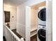 Convenient laundry area with washer and dryer, built-in shelving at 7715 Ryefield Dr, Sandy Springs, GA 30350