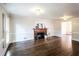 Living room with hardwood floors, fireplace and large windows at 7715 Ryefield Dr, Sandy Springs, GA 30350