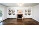 Living room with built-in shelving and fireplace at 7715 Ryefield Dr, Sandy Springs, GA 30350